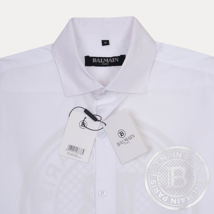Balmain Elegant Silver Emblem Button-Up Shirt in Pristine White
